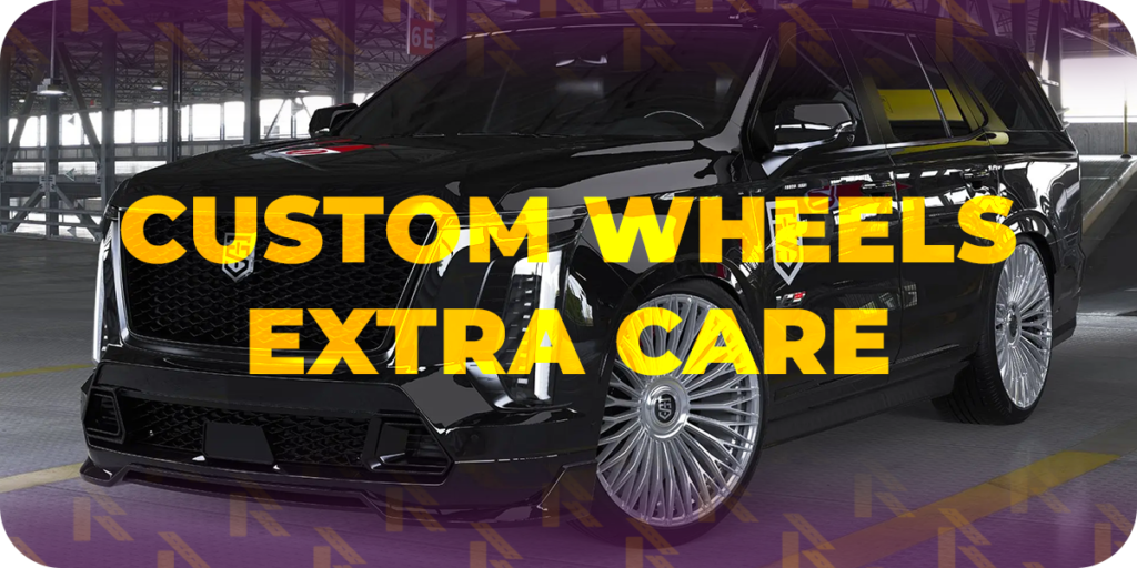 Black luxury SUV with custom wheels ready for enclosed auto transport